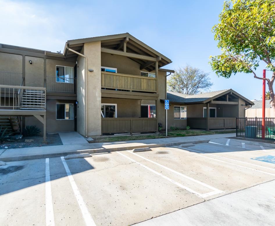 a building with a parking lot
