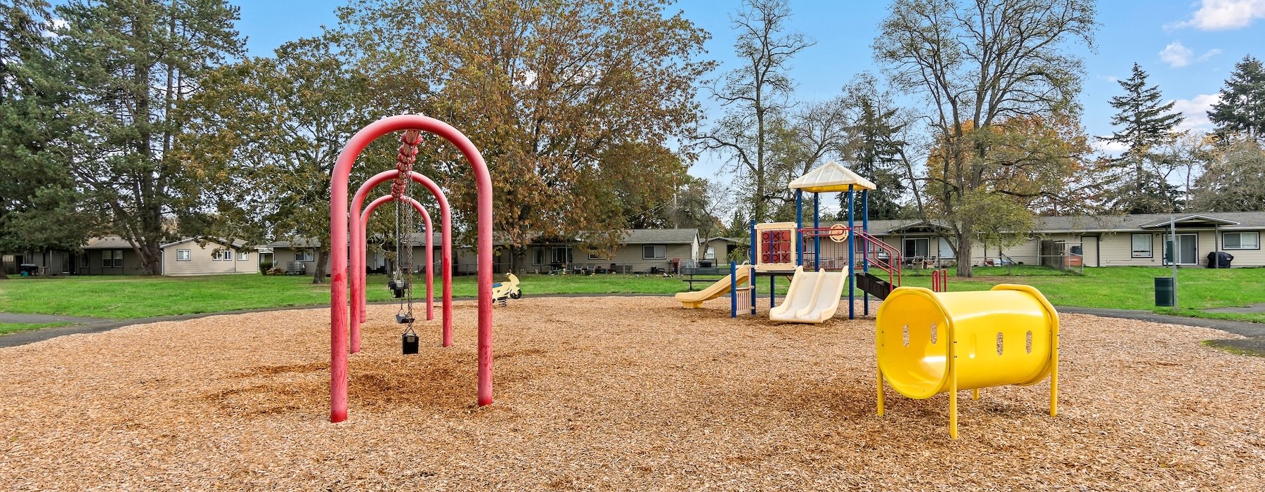 a playground with a swing set
