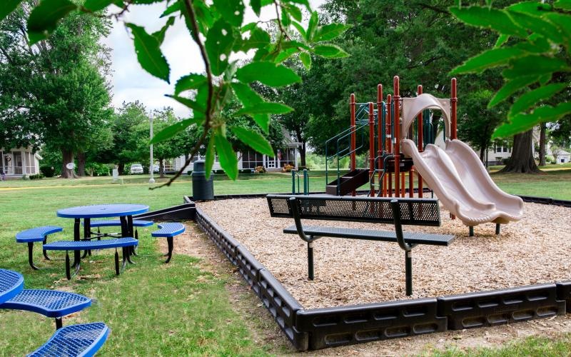 a park with benches and tables
