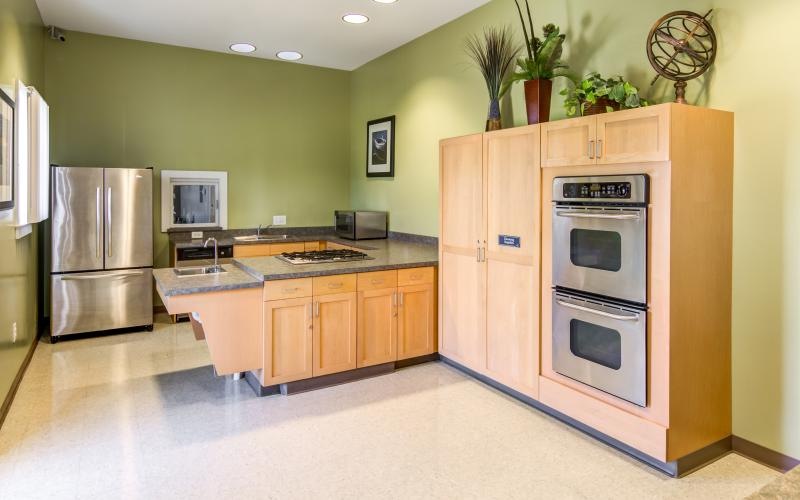 a kitchen with stainless steel appliances