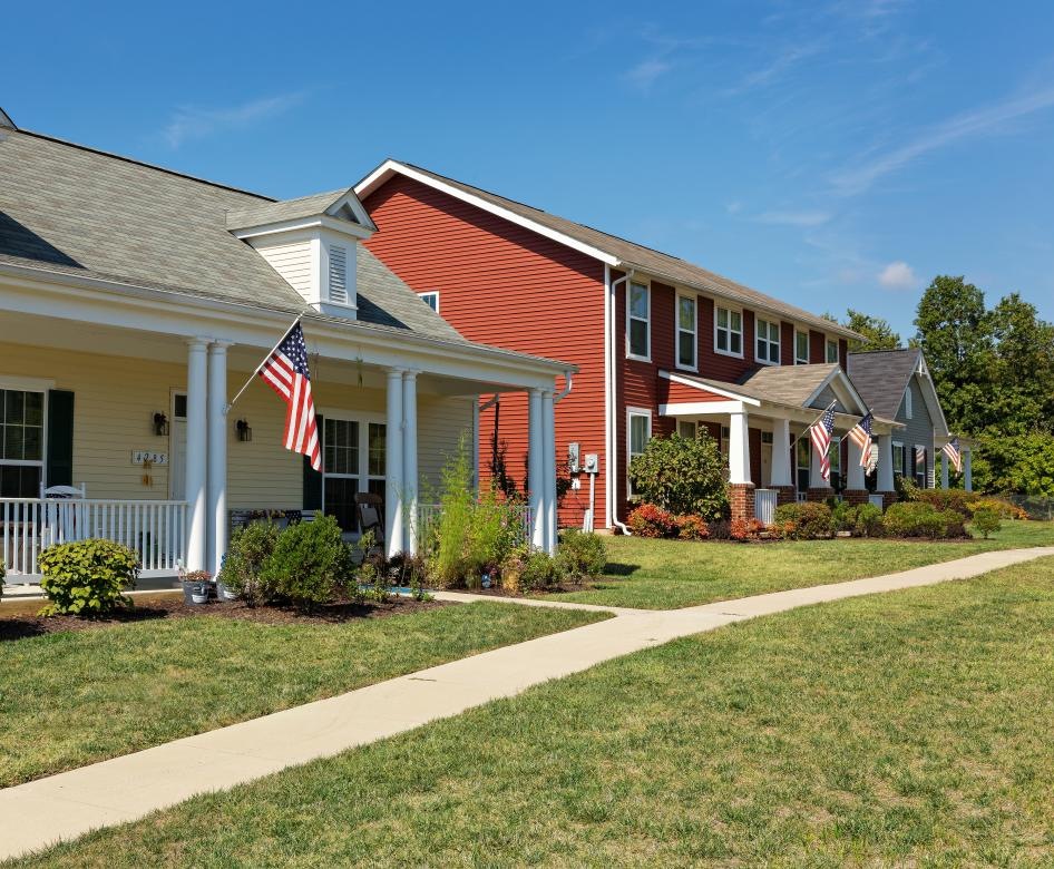 a house with a flag on the porch