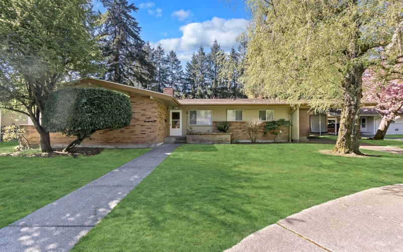 a home with trees and front yard