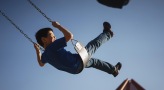 a boy on a swing