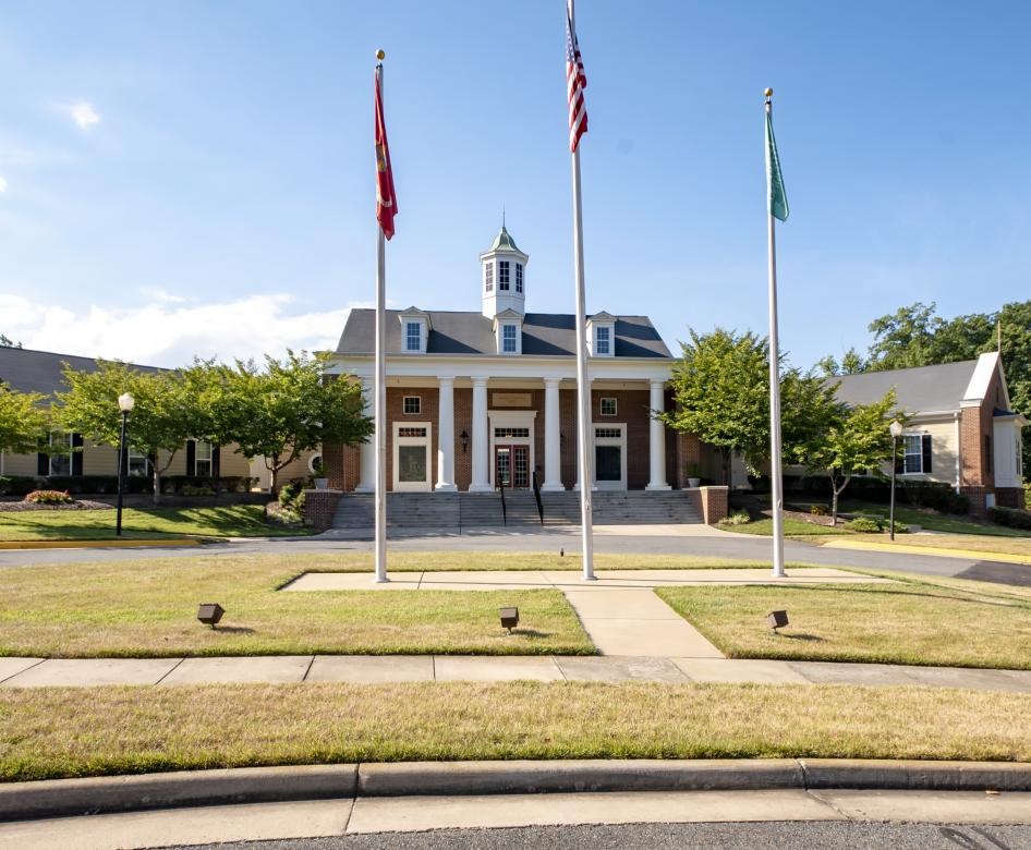 a building with flags in front of it