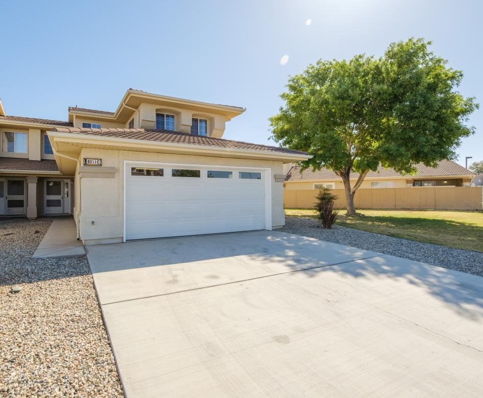 a building with a tree in the front