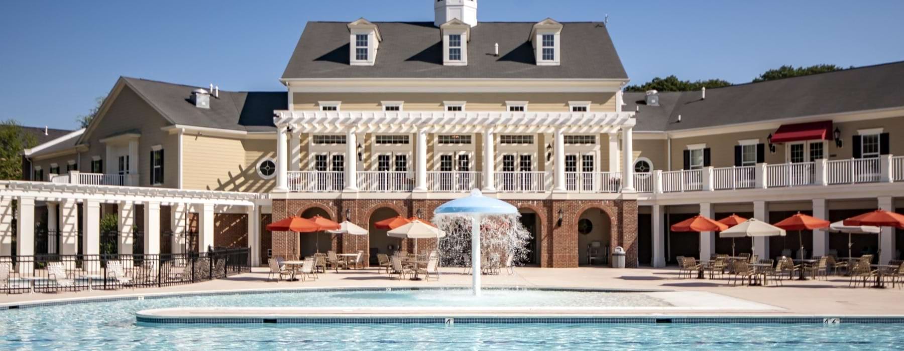 a pool in front of a building