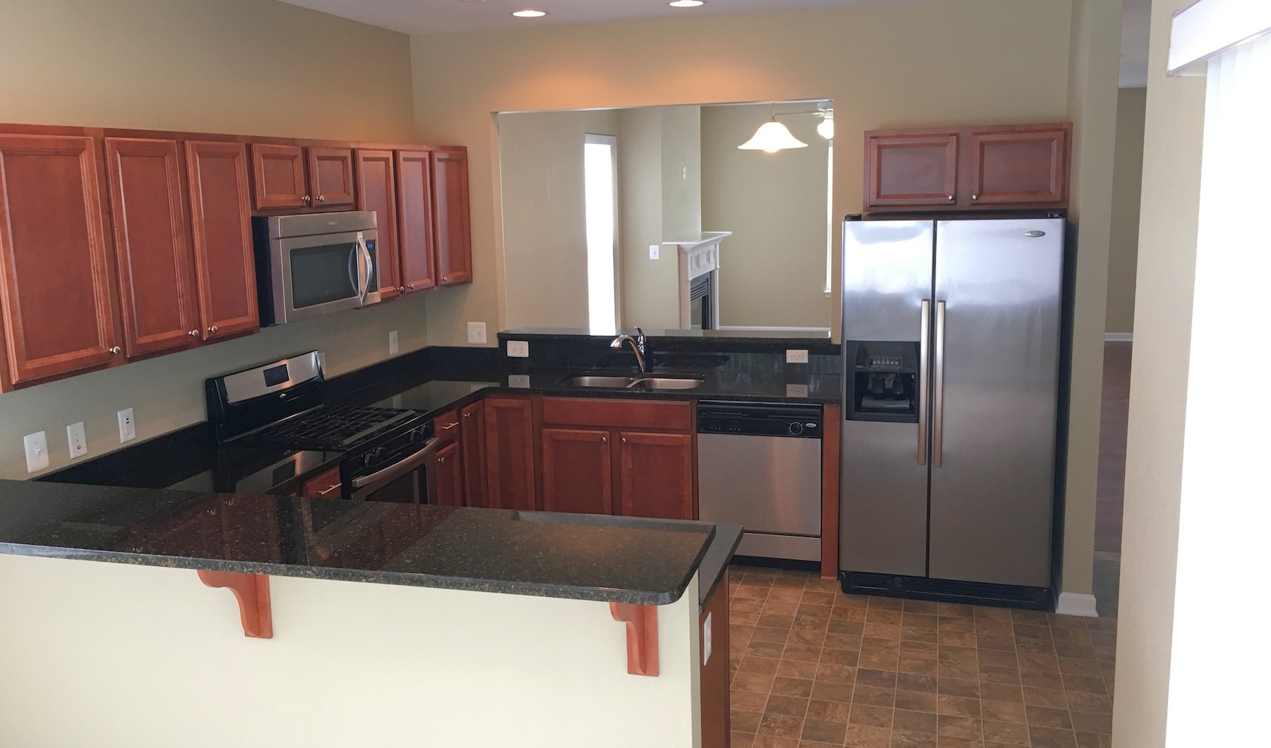 kitchen with stainless fridge 