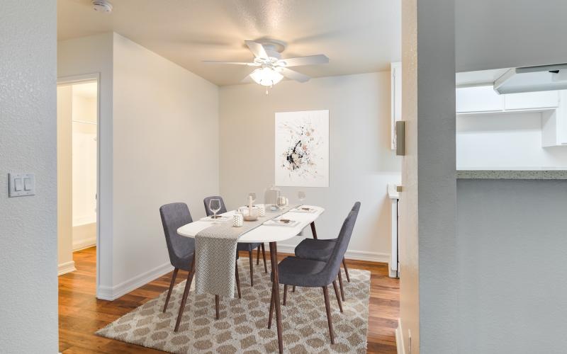 a dining room table with chairs
