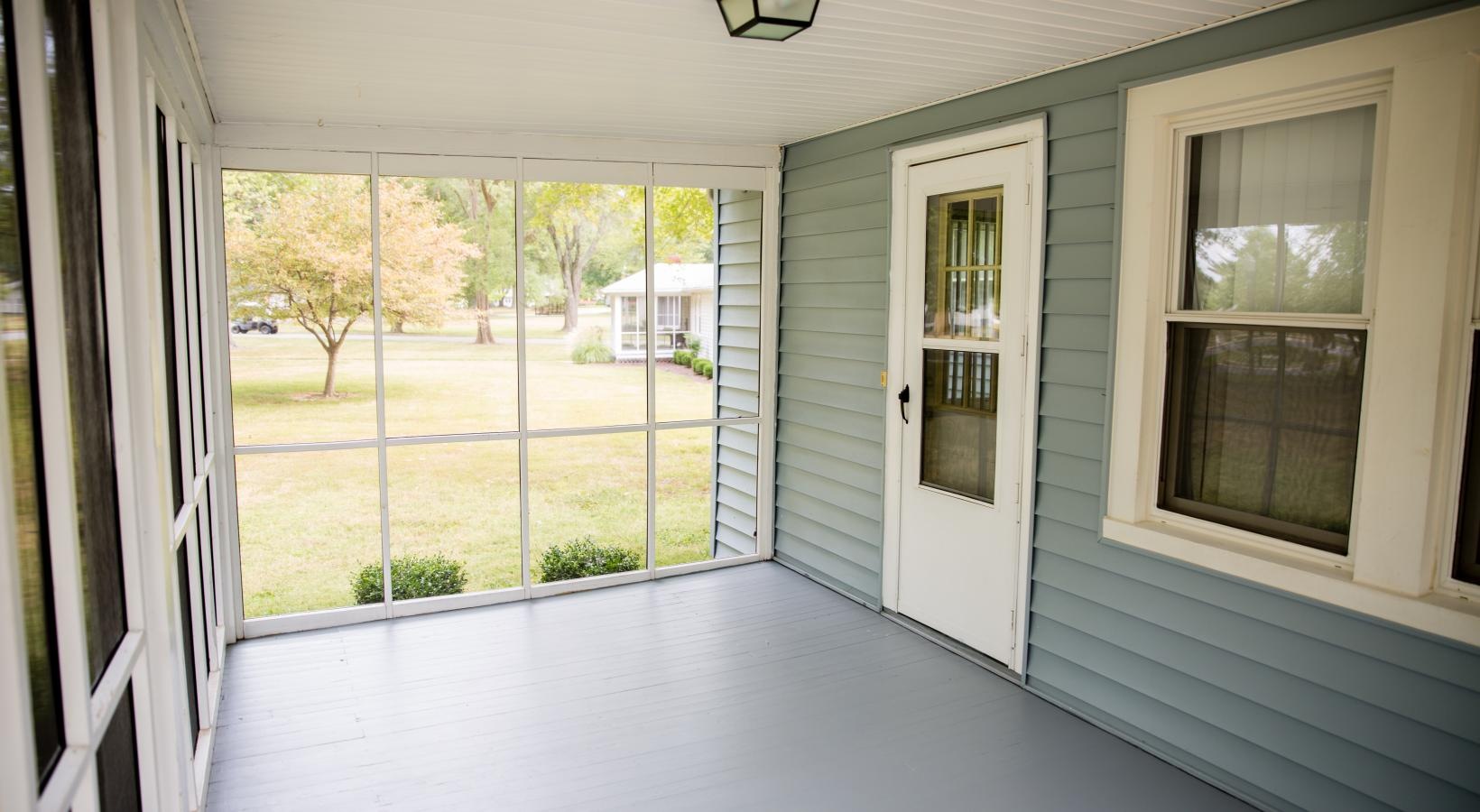 a room with windows and a light