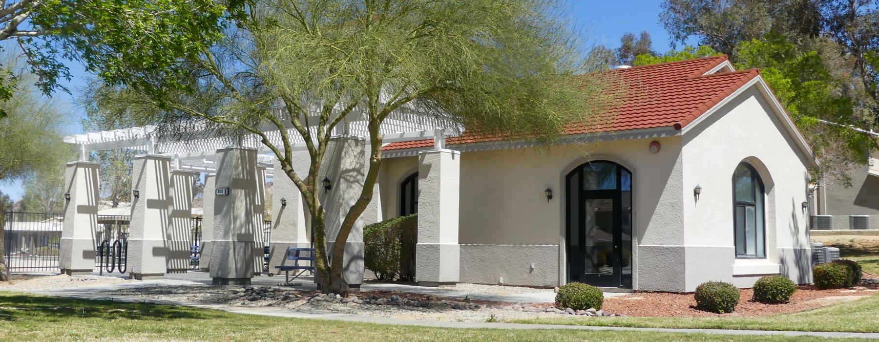a white house with a red roof