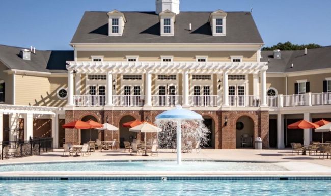 a pool in front of a building