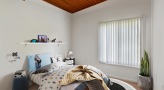 a room with a ceiling fan