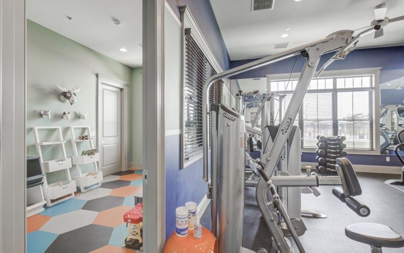 a room with treadmills and a window