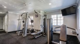 fitness center with exercise equipment