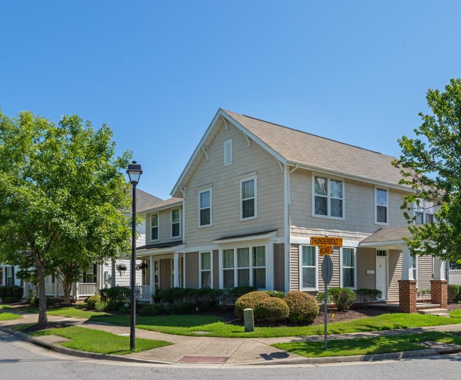 home on corner lot with trees