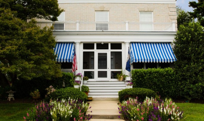 a house with a flag on the front