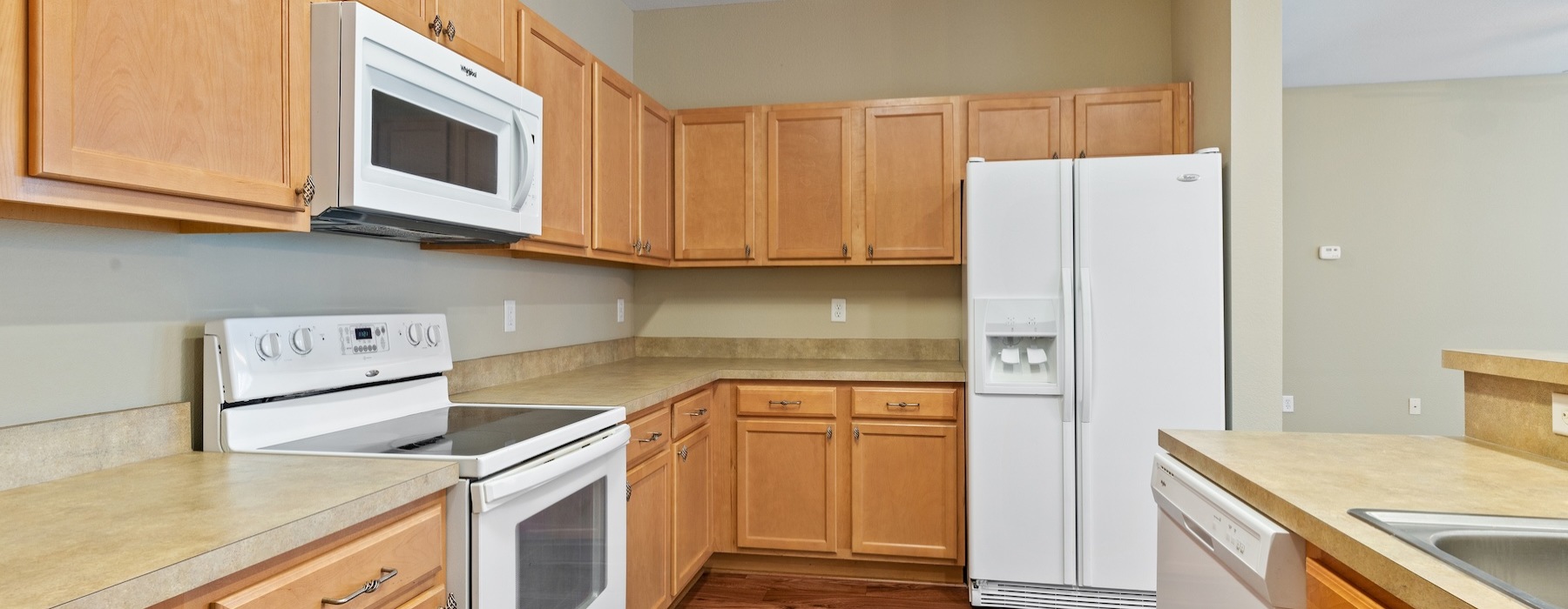 Well-lit kitchen with ample counter space