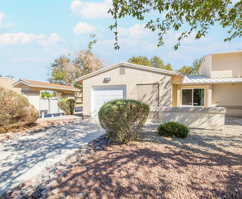 a house with a gravel driveway