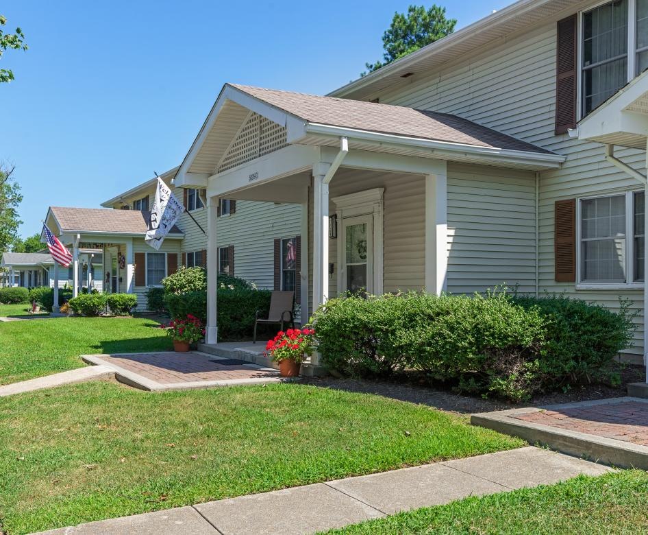 neighborhood row of homes with front porches