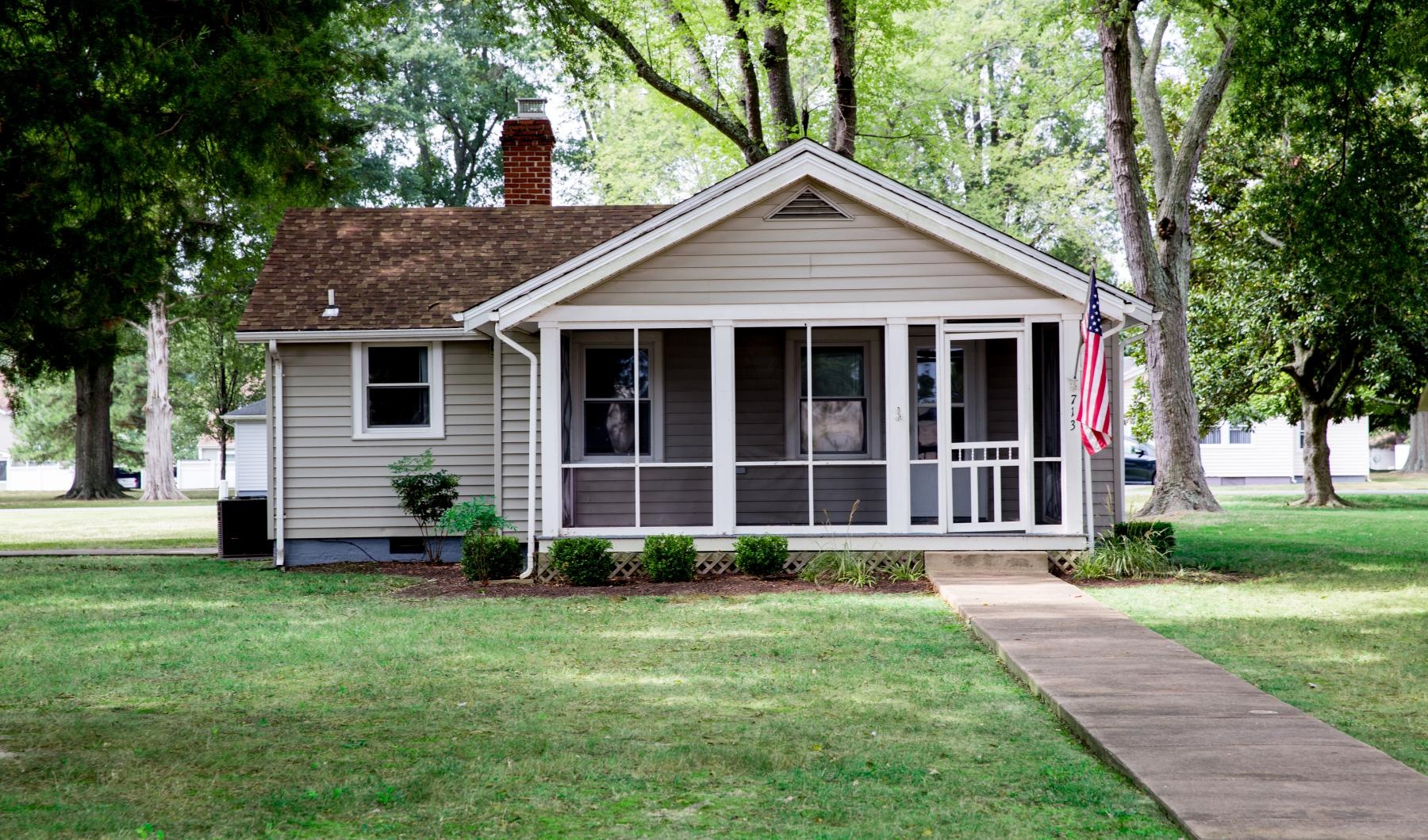 a house with a flag on the front