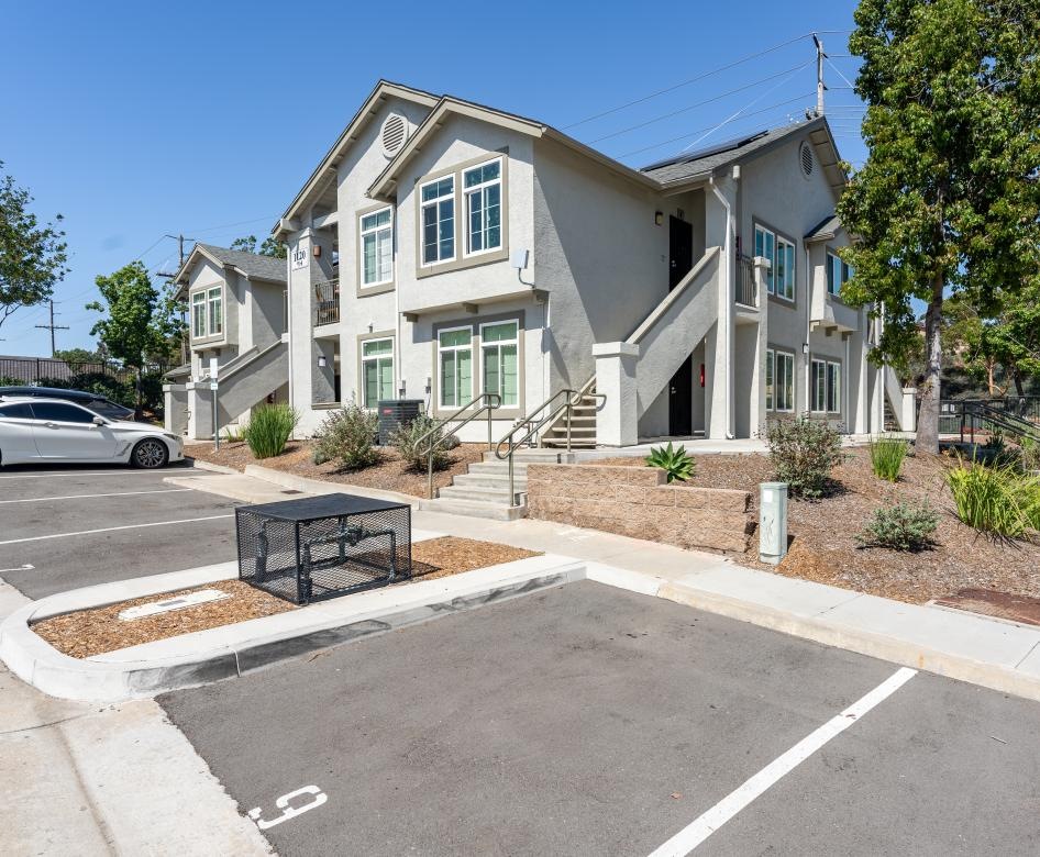 parking lot in front of Paradise Gardens homes