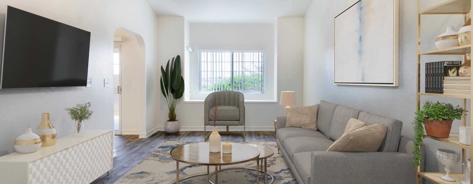 a living room with a couch and a table