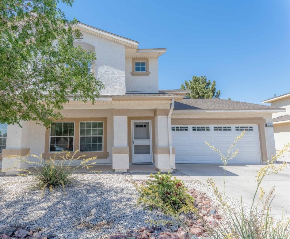 a building with a tree in front