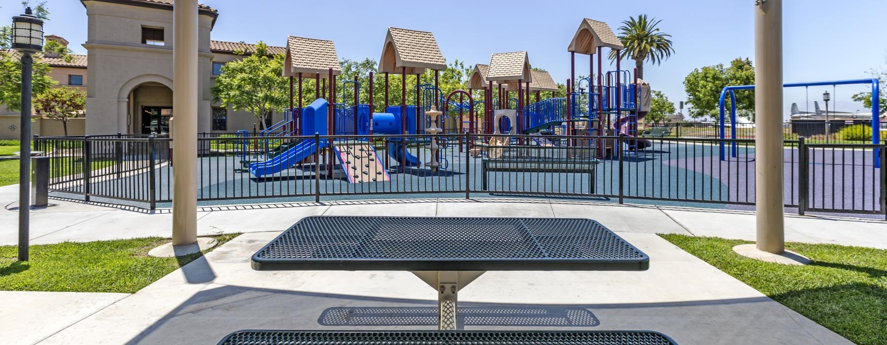 covered picnic area next to playground