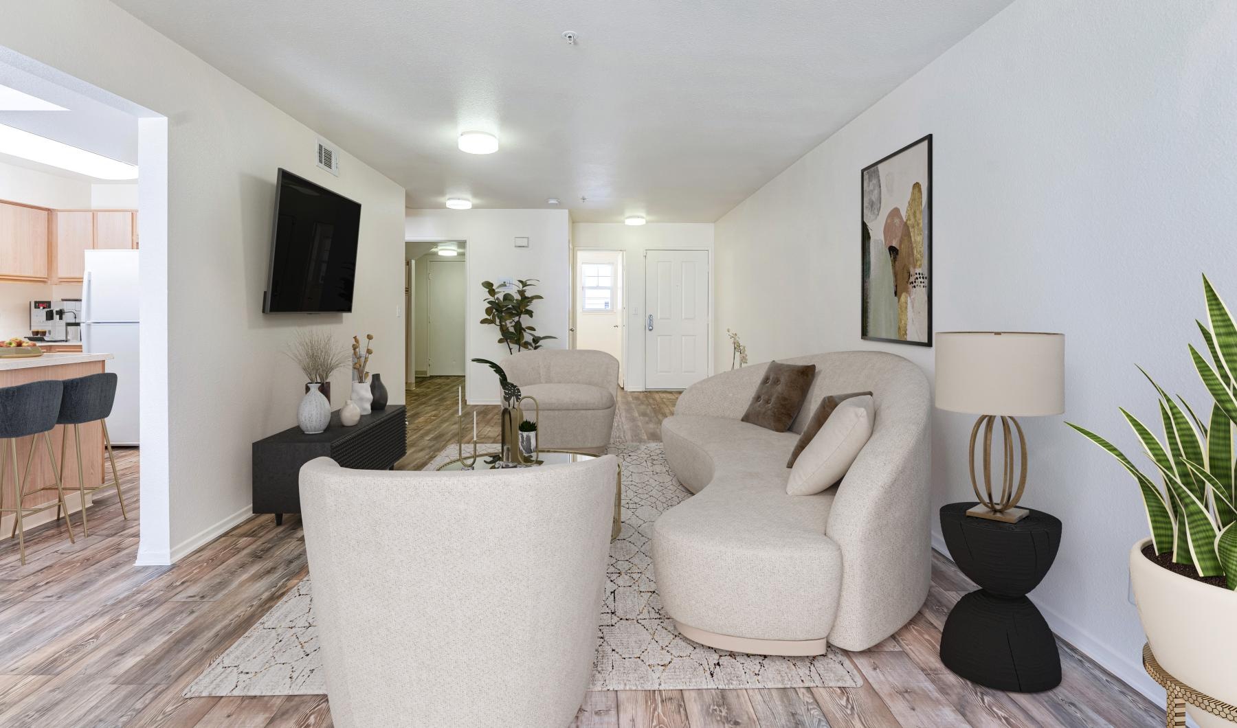 a living room with white furniture