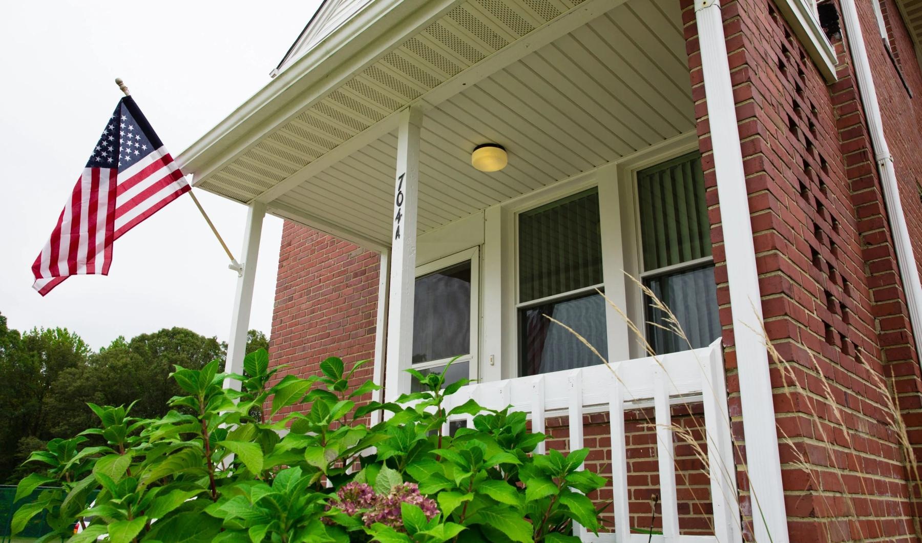 a flag on a house